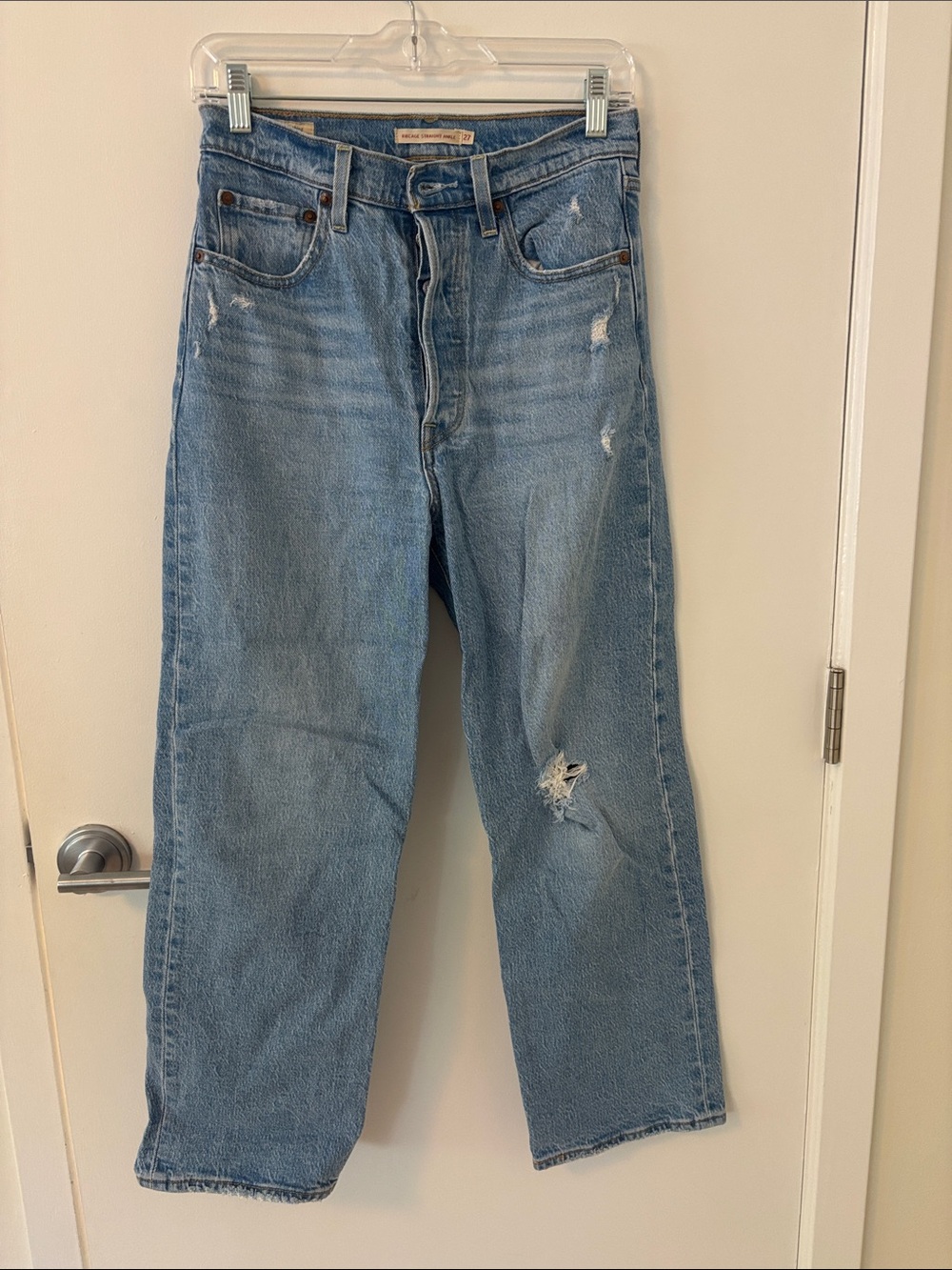 Levi's Light Blue Relaxed Straight Jeans with Distressed Knee
